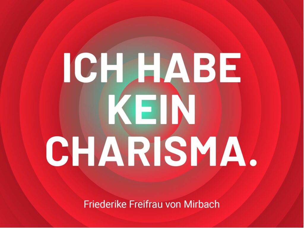 Roter Hintergrund mit kreisförmigen Farbverläufen und dem Text „Ich habe kein Charisma.“ Blog Beitrag von Friederike Freifrau von Mirbach.